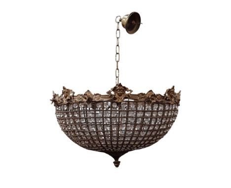 the basket light with a Rococo cartouche supporting the cut glass and mesh body, all terminating in an acorn finial