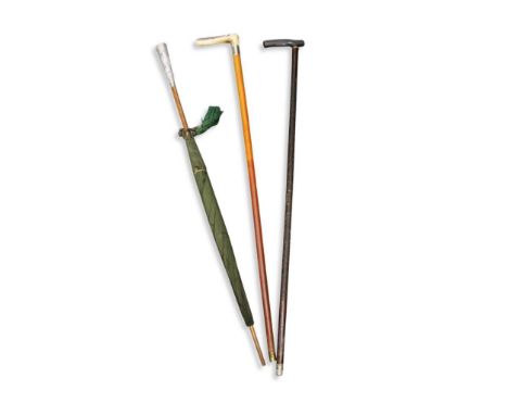 with silver banding together with a ladies umbrella with Indian silver handle and another walking stick (3)