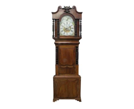 the large clock with a painted Roman numeral face with multiple complications, the case decorated with disengaged pillars, al