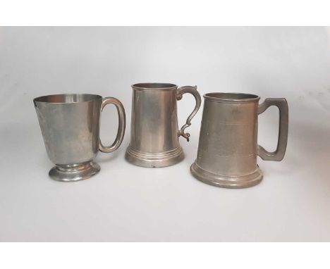 THREE VARIOUS PEWTER TANKARDS Largest tankard 13.5cm high