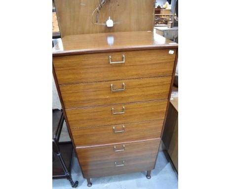 A mid century Lebus tall chest of six drawers.