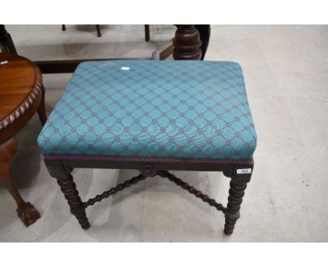 A Victorian dressing table stool on a bobbin turned framed with cross brace