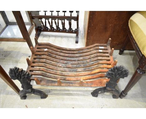 A traditional cast iron dog grate