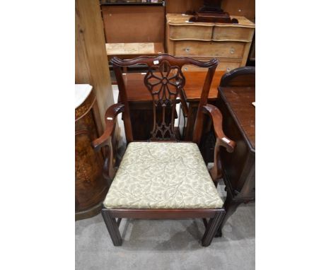 A reproduction mahogany armchair, of Hepplewhite or Chippendale design