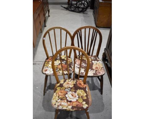 Three (two and one) traditional hoop and stick back chairs, possibly Ercol