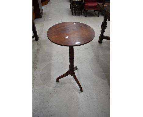 An early 20th century wine table having Mahogany frame on turned support and tripod base.