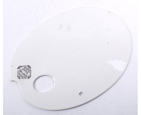 A Rowney &amp; Co ceramic artist's palette. L26cm