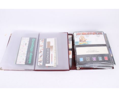 A collection of assorted first day covers from 1990s. In two albums. 
