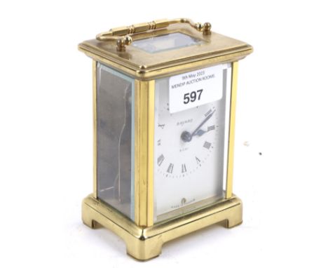 A Bayard 8 day carriage clock. The white dial with Roman numerals, in a brass case with handle to the top, H11.5cm