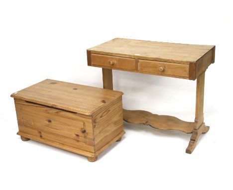 A contemporary pine trunk chest and a desk. Desk has two drawers with twin supports and a stretcher L90cm x D49cm x H74cm.