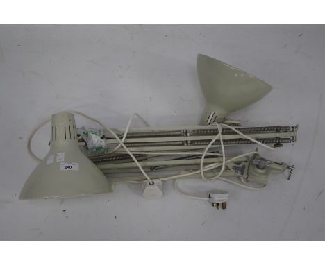 A pair of light grey anglepoise work lamps. With clamps, shade diameter 20cm
