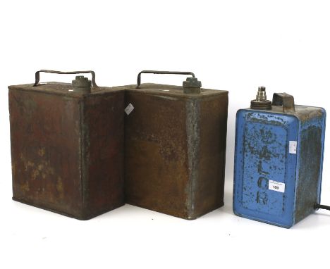 Three vintage petrol cans, one converted into a lamp. Including one for 'Shell Motor Spirit' and another for 'Valor', Max H32