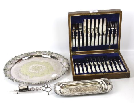 A set of twelve plated and mother of pearl handled tea knives and forks, in a wood case; a candle snuffers and snuffer tray; 