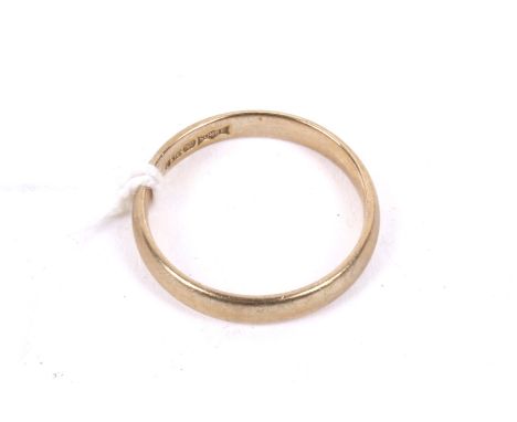 A 9ct gold wedding band. Post 2000 convention hallmarks, size M, 2.1g