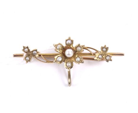 An early 20th century gold and half-pearl floral fob brooch, unmarked, 2.6g gross