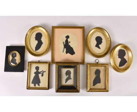 Six portrait silhouettes, 19th, early 20th century, including two of gentleman wearing broad collar and cravat, one being a c