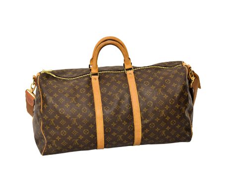 A Louis Vuitton style holdall, believed to be a copy, in monogram canvas with faux-suede cloth lining, single zipped inside p