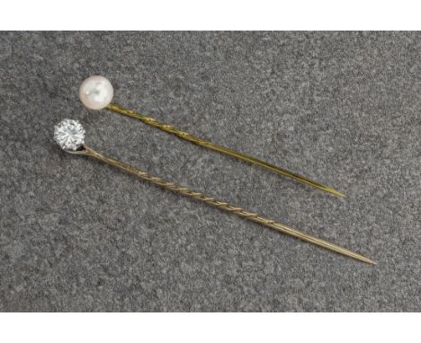 A mid-century 9ct gold and diamond stick pin, 1930s-40s, the single brilliant cut diamond weighing approx. 0.40ct, claw set o