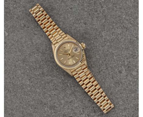 A ladies 18ct gold Rolex Oyster Perpetual Datejust automatic wristwatch, the 25mm. case with fluted bezel, caseback signed 'O