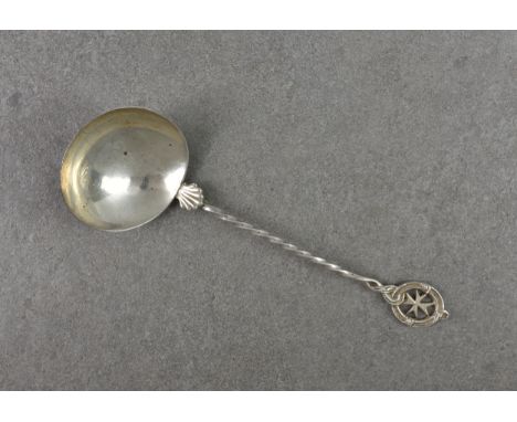 A Maltese silver sauce ladle, the twist handle starting with a scallop shell and terminating with Maltese cross within ring a