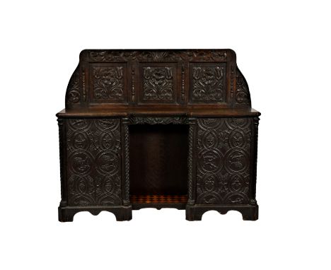 A Victorian carved oak side cabinet, made using some earlier elements, the shaped three panel back from a 17th century coffer