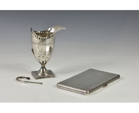 A George III silver helmet form cream jug, Peter &amp; Ann Bateman, London, 1793, of typical form with engraved foliate decor