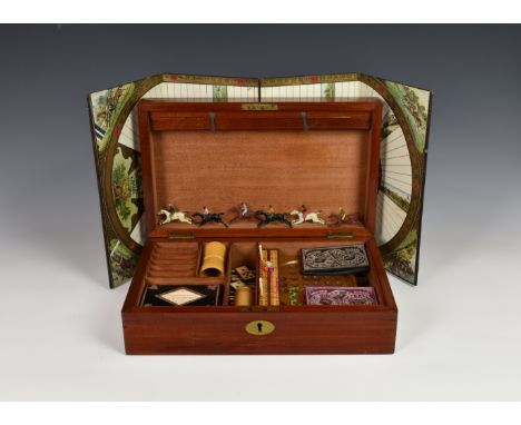 A vintage mahogany games box with many games and accessories, contents to include multi purpose folding board for chess; back