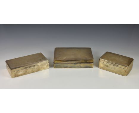 Three early 20th century silver cigarette / cigar boxes, comprising a large rectangular domed cigar box with rounded corners 