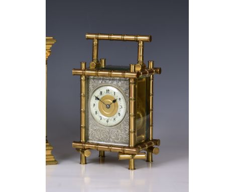 A large French gilt brass bamboo cased carriage clock, late 19th century, the foliate engraved, silvered dial plate with enam