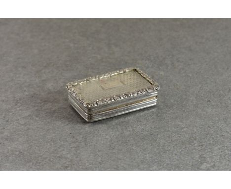 A George IV silver vinaigrette, Joseph Wilmore, Birmingham 1827, of rounded rectangular form, with engine turned detail, cast