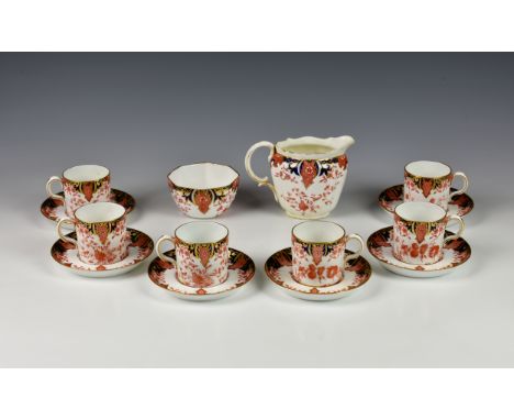 A set six Crown Derby Imari pattern coffee cans &amp; saucers with milk jug and sugar bowl, pattern number 2712. (14) 