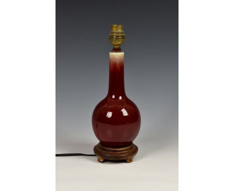 A Chinese flambe glazed bottle vase, later converted to a lamp, base drilled, probably 18th/19th century, the globular body r