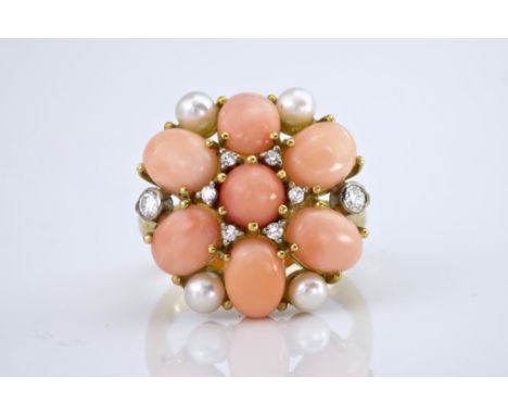 An 18ct yellow gold, coral, pearl &amp; diamond cluster ring, featuring seven oval coral cabochon measuring approximately 8x6