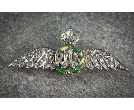 A 14ct gold, platinum, enamel and diamond RAF wings sweetheart brooch, mid-century, with green enamel wreath and rose cut dia