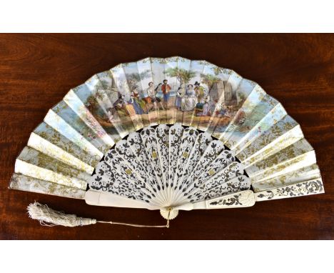 An early 19th century French carved and silver gilt inlaid bone fan, the guards with shell carving and pierced and silver gil