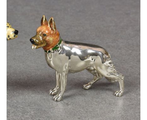 An Italian miniature silver and enamel model of a Alsatian dog by Saturno, unmarked, standing 2½in. (6.4cm.) high, nose to ti