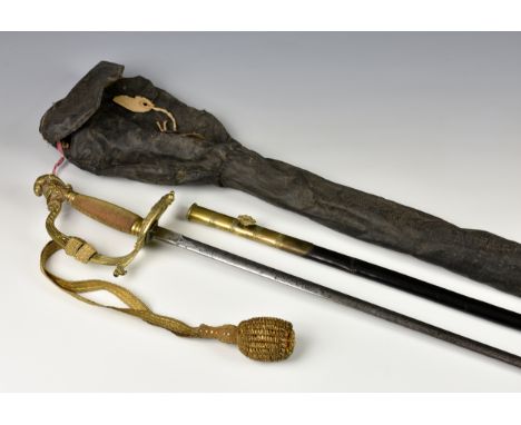 A Victorian court sword with brass plumed helmet pommel, gilt metal wire wrapped grip, 31in. partly etched blade, leather bra