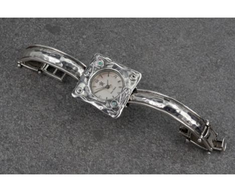 A silver and opal Art Nouveau style ladies wrist watch, c.1995, the 15mm. circular silvered dial signed 'Silver Island', with