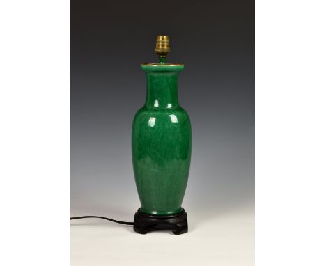 A Chinese porcelain green glazed rouleau vase, probably 19th century, later converted to a lamp, base drilled, the lightly cr