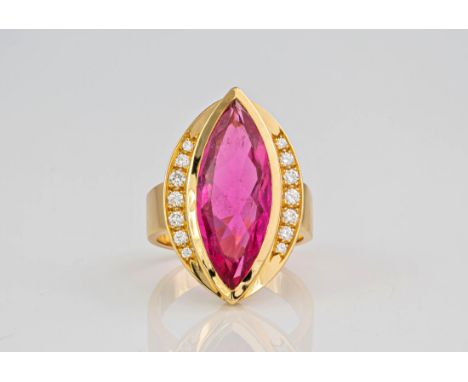 A marquise cut pink tourmaline and diamond 18ct yellow gold ring., A pink tourmaline in a diamond set bezel totalling approxi