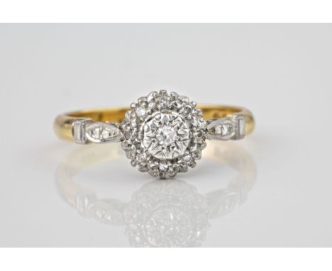 A mid-century style 18ct gold and diamond cluster ring, the central illusion set eight cut diamond within a border of smaller