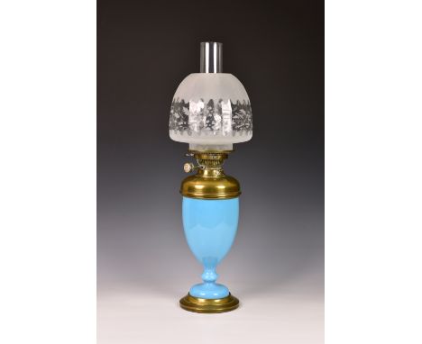 A Victorian polished brass and blue ceramic oil lamp by Hinks & Son, the blue ovoid form body mounted with polished brass fit