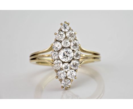 A fine antique 18ct yellow gold and diamond navette ring, featuring approximately 0.85ct of old cut diamonds held in prong se