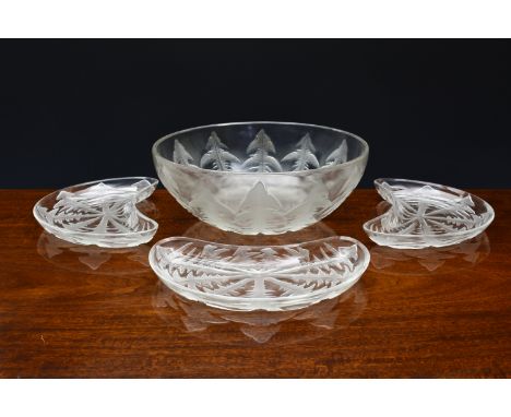 A Lalique moulded clear glass Pissehlit (Dandelion) salad bowl and six side dishes, mid 20th century, the outside of the bowl