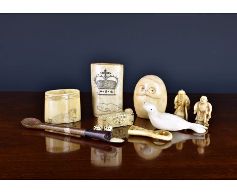 A small collection of antique bone and ivory curiosities, to include two Japanese figural ivory netsukes, probably Meiji peri