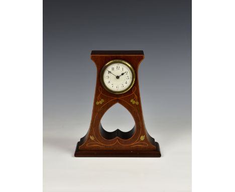 An Art Nouveau walnut and marquetry table clock, c.1905, the white enamel Arabic dial fronting a single train movement with v
