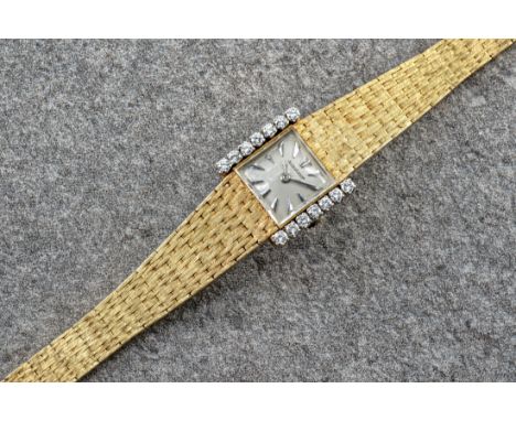 A 1950s-60s Jaeger LeCoultre 18ct gold and diamond backwind ladies wrist watch,&nbsp;no. 824906, the 10mm. silvered square di