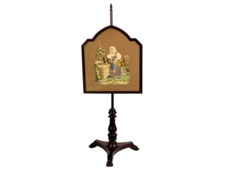 A William IV mahogany pole screen, the lancet arched screen with a 19th century needlework of an Italian woman in a garden, r