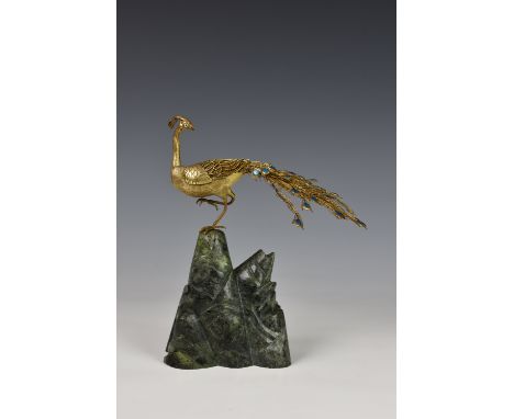 A Chinese sterling silver gilt limited edition "Peking Peacock", with enamel decorated tail and eyes, 433/560, on green hards