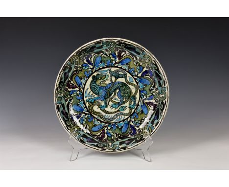 Charles Passenger for William De Morgan (1839-1917) - a 'Persian' shallow dish or charger, Fulham period (1898-1907), painted